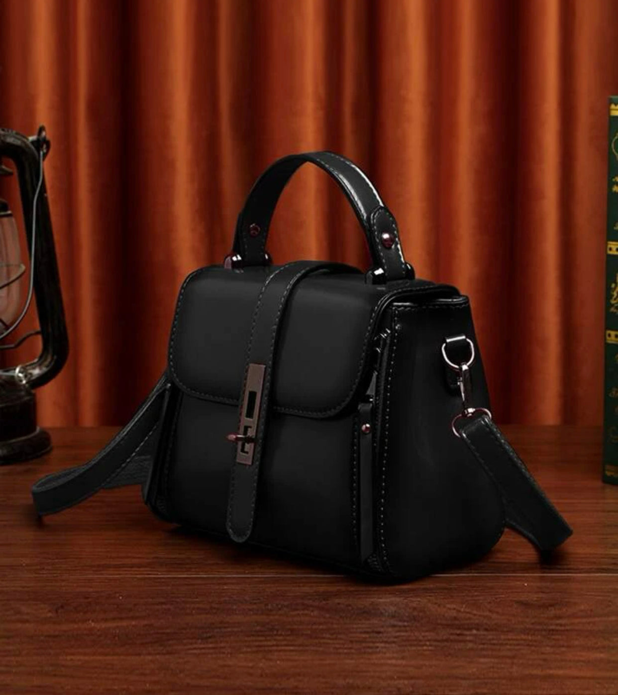 Black minimalist twist lock satchel bag