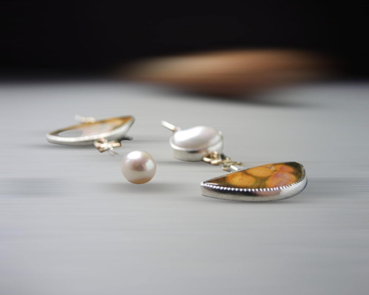 Elegant yellow stone embellished with pearl asymmetric dangle earrings