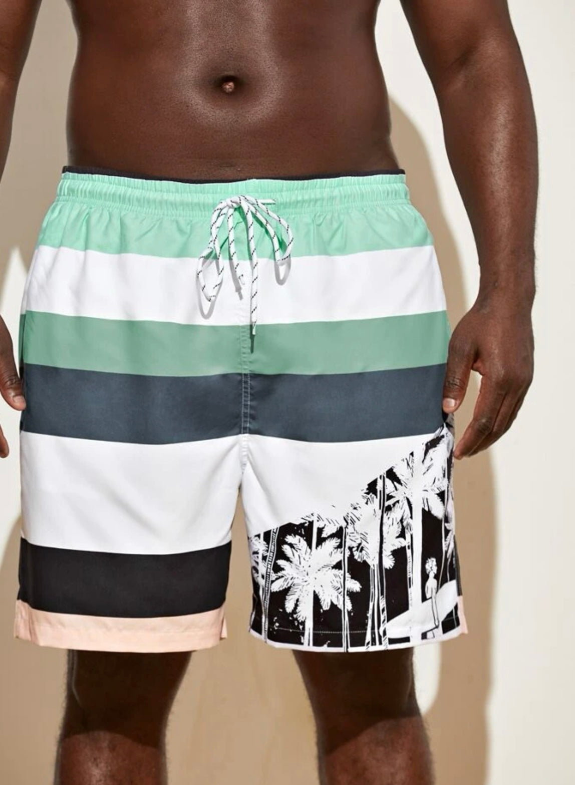 Extended sizes men coconut tree and figure graphic colorblock drawstring waist swim trunks