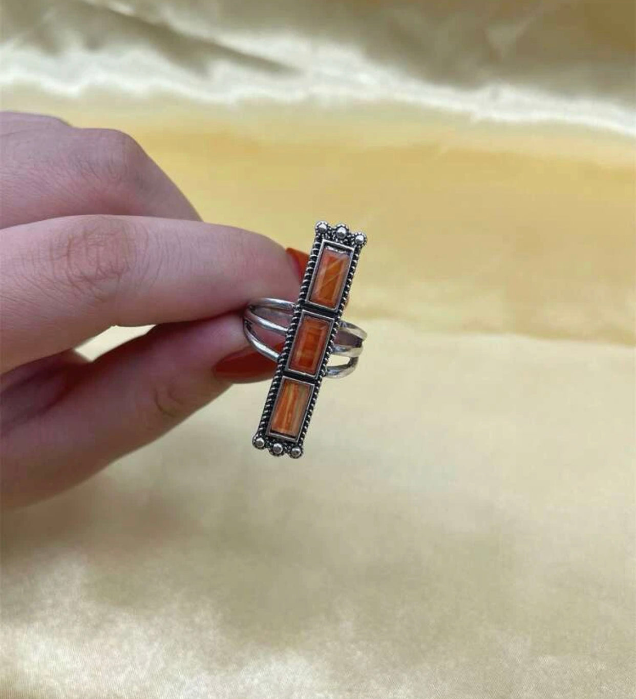 Spiny oyster inspired rectangle decor ring.