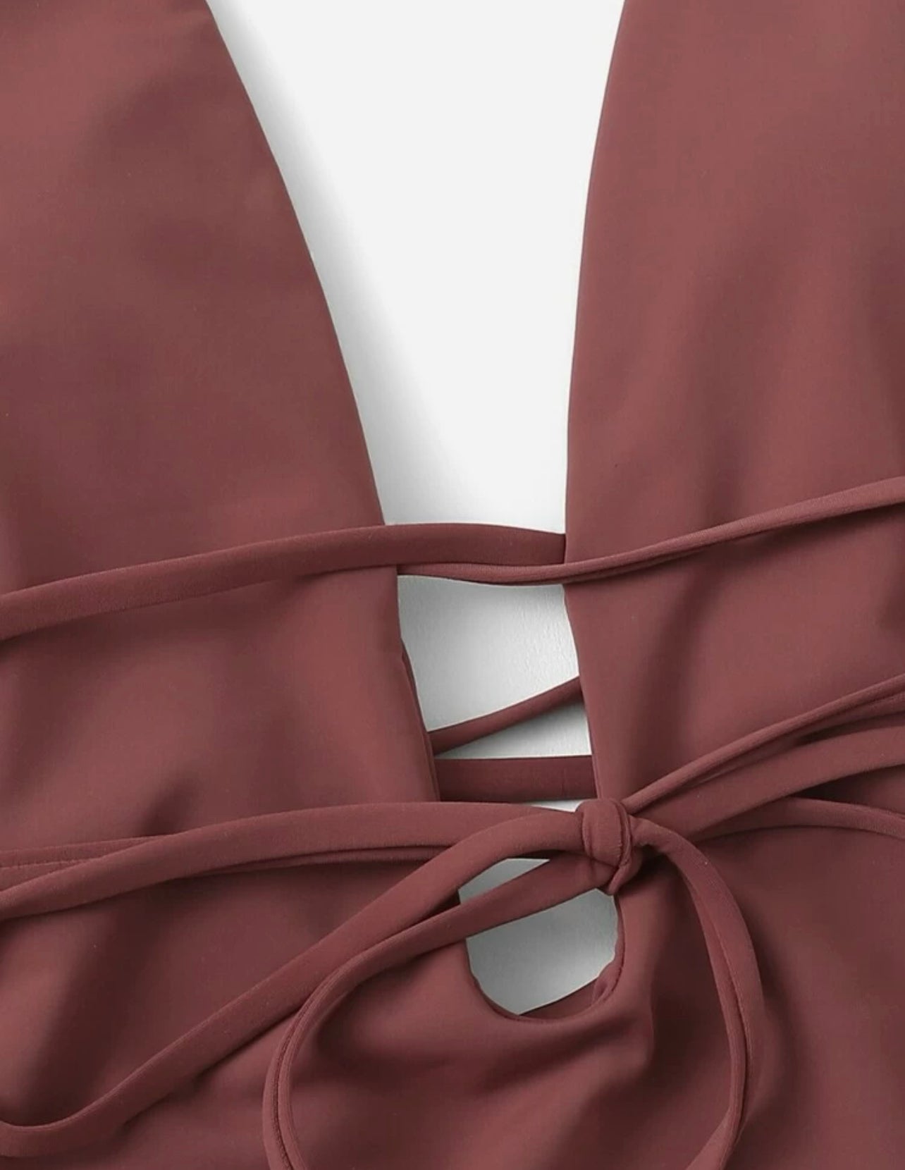Plunging belted low back one piece swimsuit