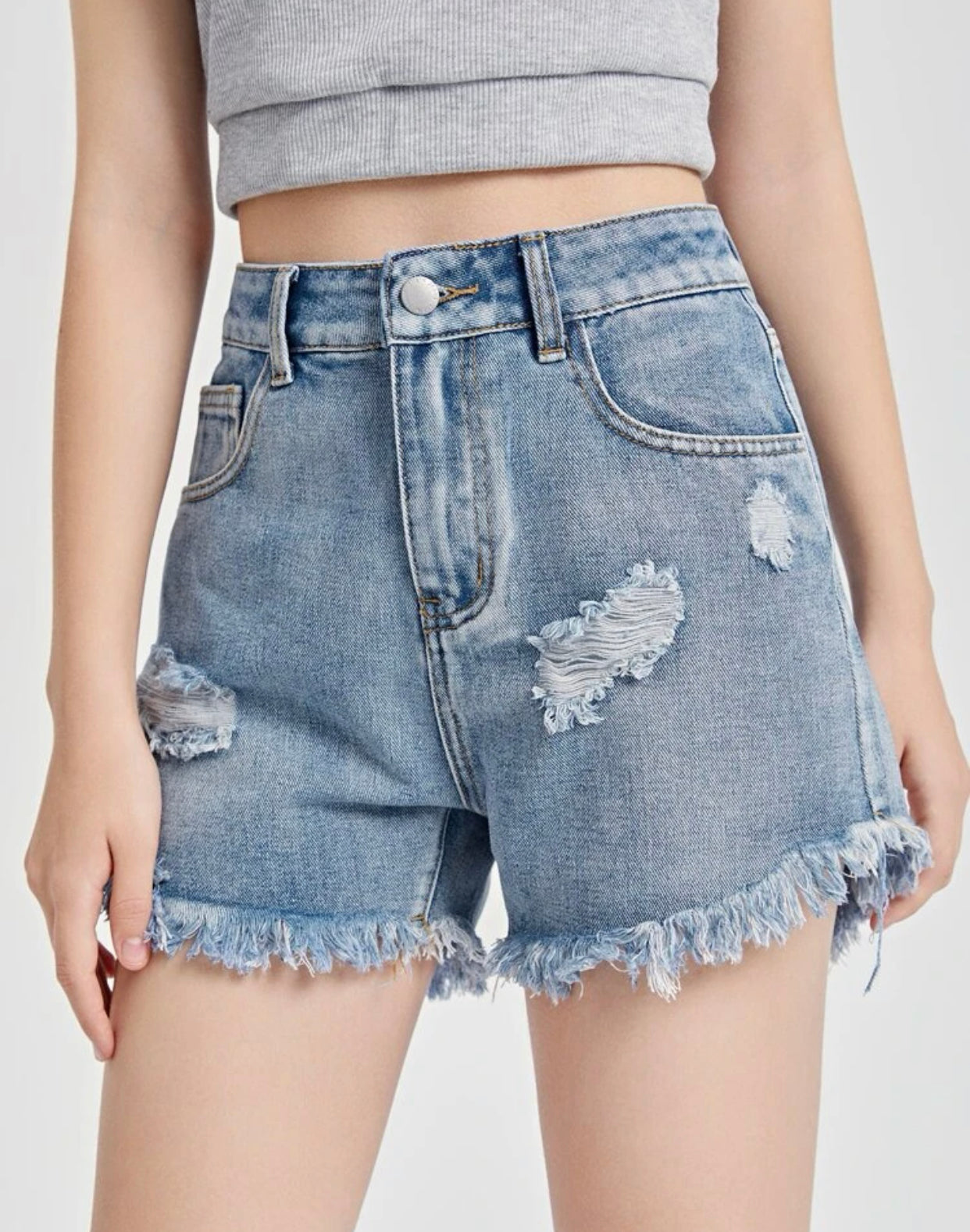 Teen girls ripped raw cut denim shorts