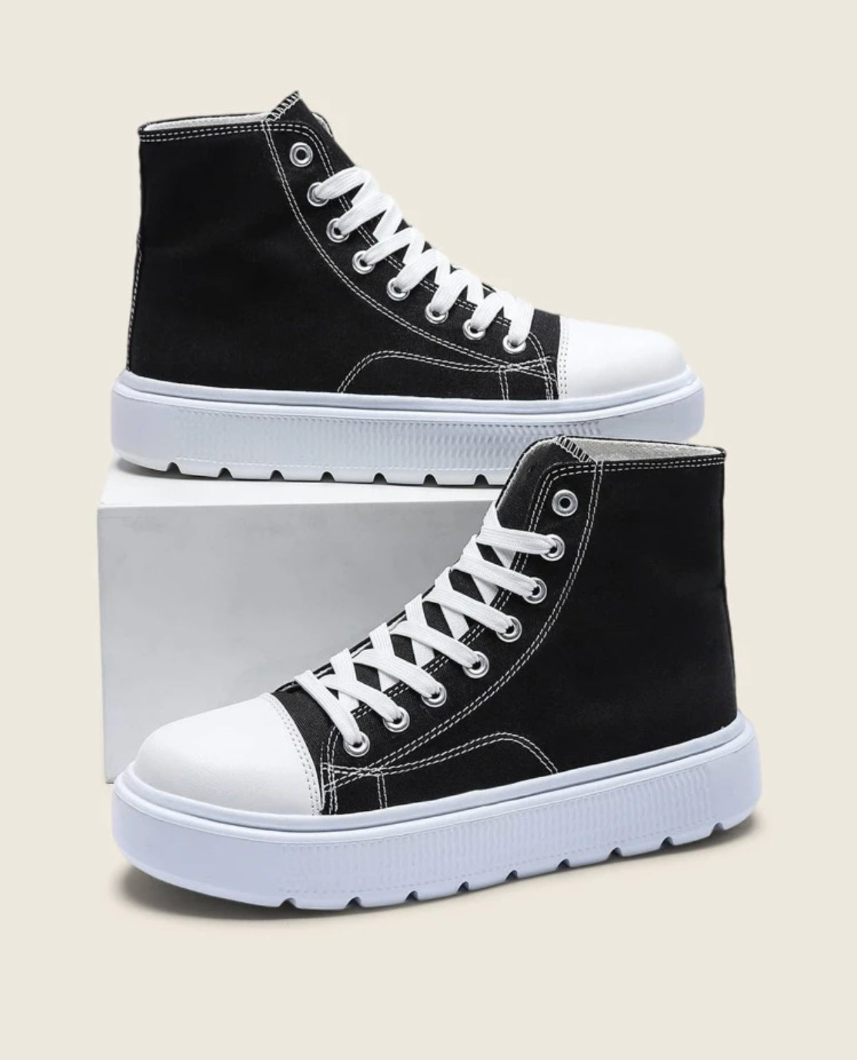 Black lace-up front high top skate shoes