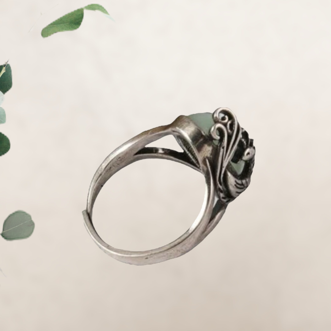 Light green geometric decor adjustable in size ring.