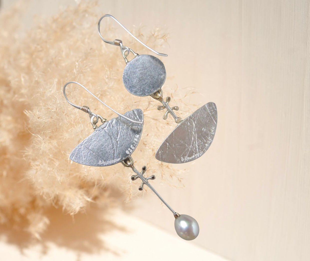Elegant yellow stone embellished with pearl asymmetric dangle earrings
