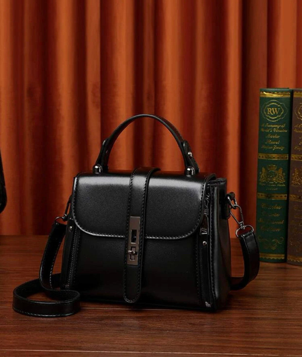 Black minimalist twist lock satchel bag