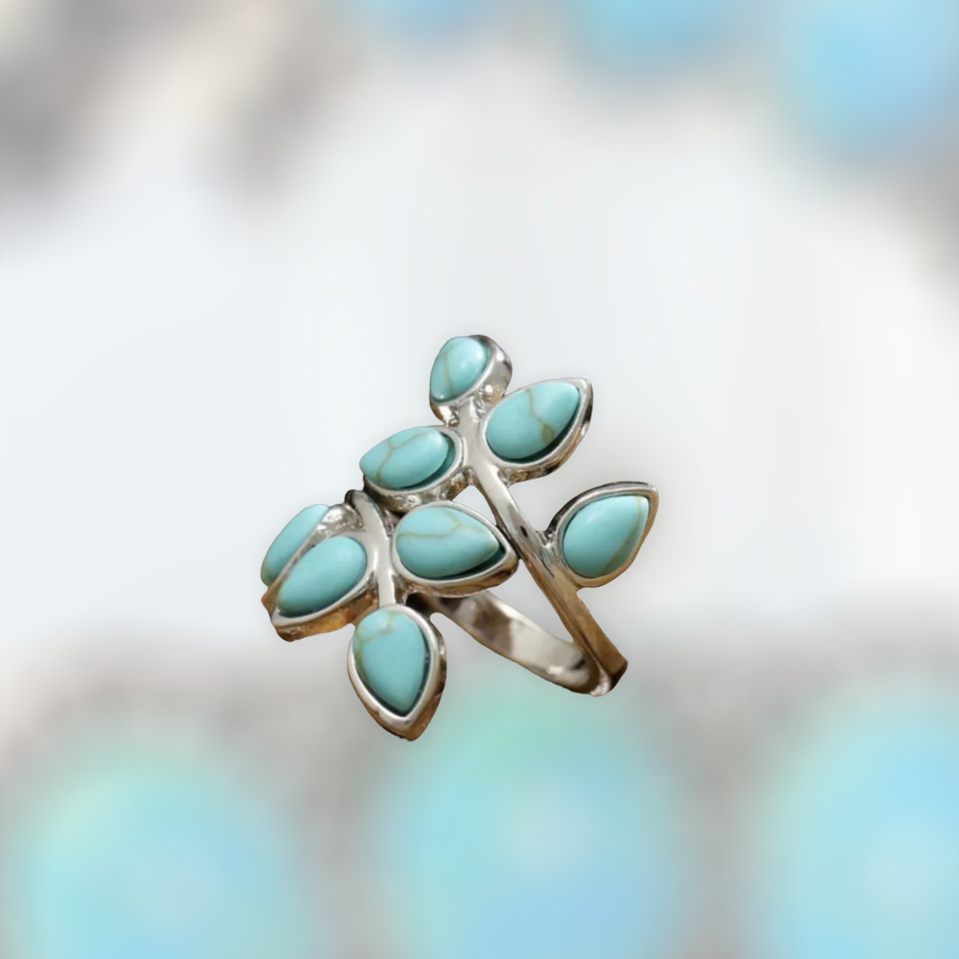 Blue swirl leaf design statement ring. Size 8.