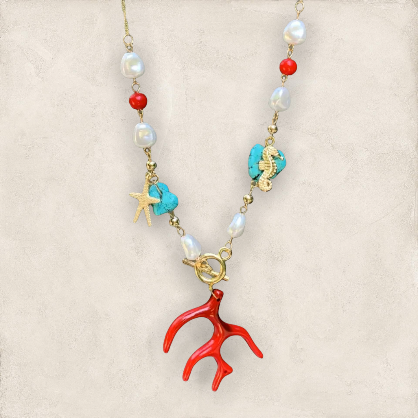 Stunning and unique coral, pearl and starfish pendant necklace