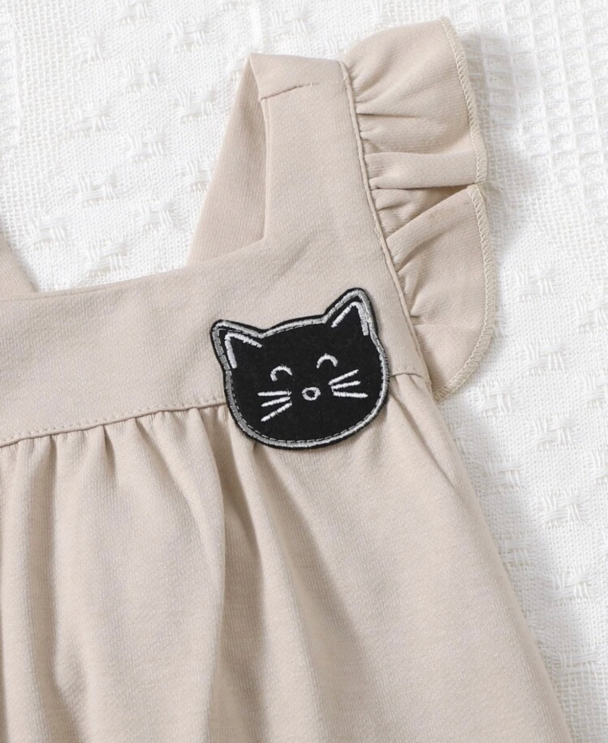 Khaki colored baby girl cartoon patched ruffle trim jumpsuit - Christina’s unique boutique LLC