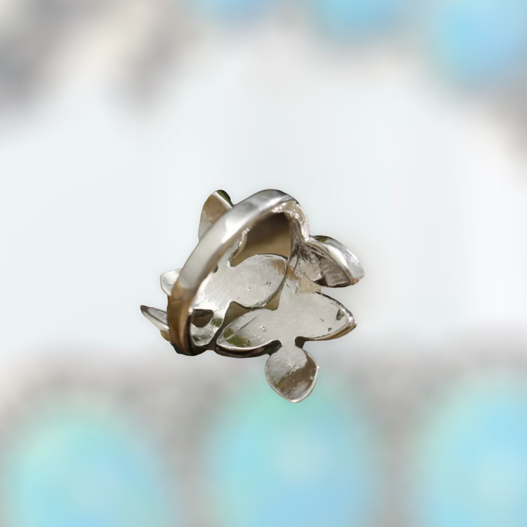 Blue swirl leaf design statement ring. Size 8.