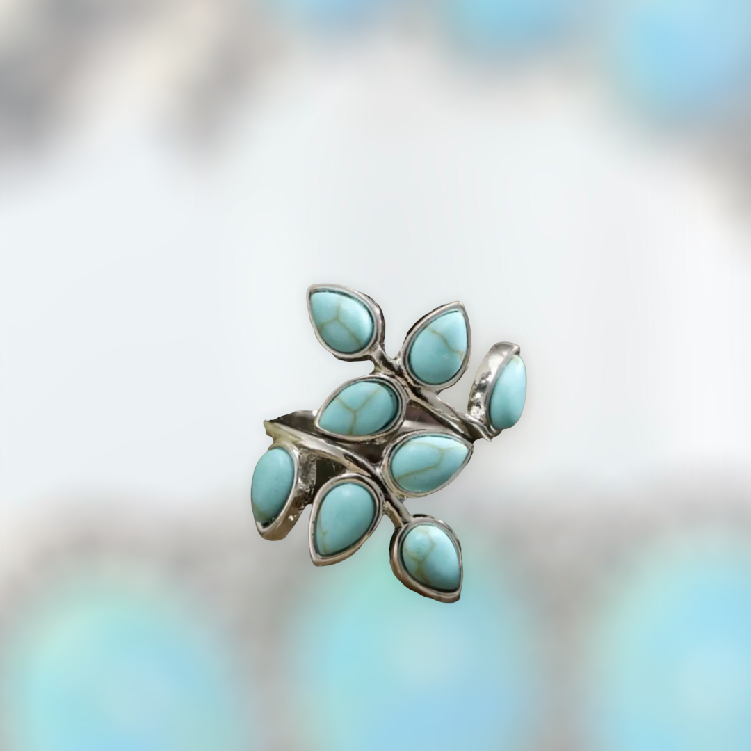 Blue swirl leaf design statement ring. Size 8.