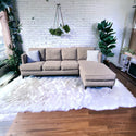 Gray studded sectional couch