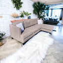Gray studded sectional couch