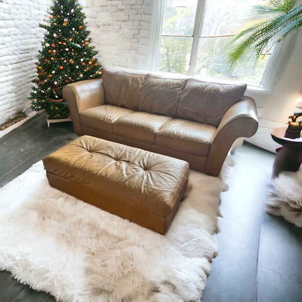 Camel colored leather couch with matching ottoman