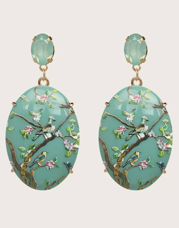 Flower and bird decor teal colored drop earrings