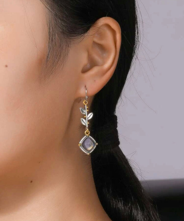 Leaf detail geometric drop earrings