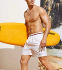 Men’s letter graphic striped trim drawstring waist swim trunks