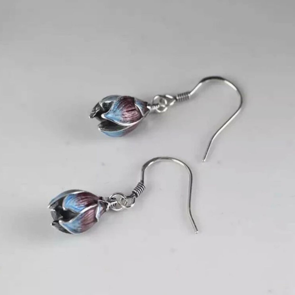 Gradient blue and amber lotus flower dangle earrings