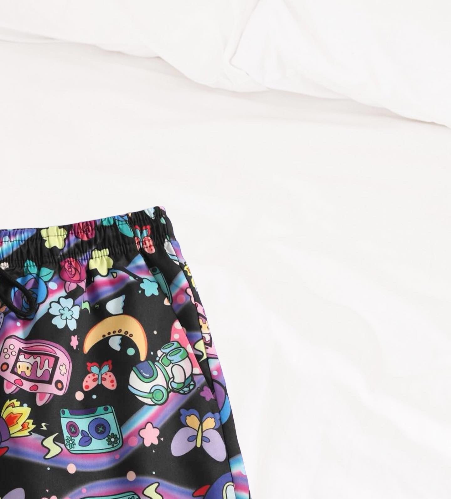 Men’s rainbow cartoon graphic shorts