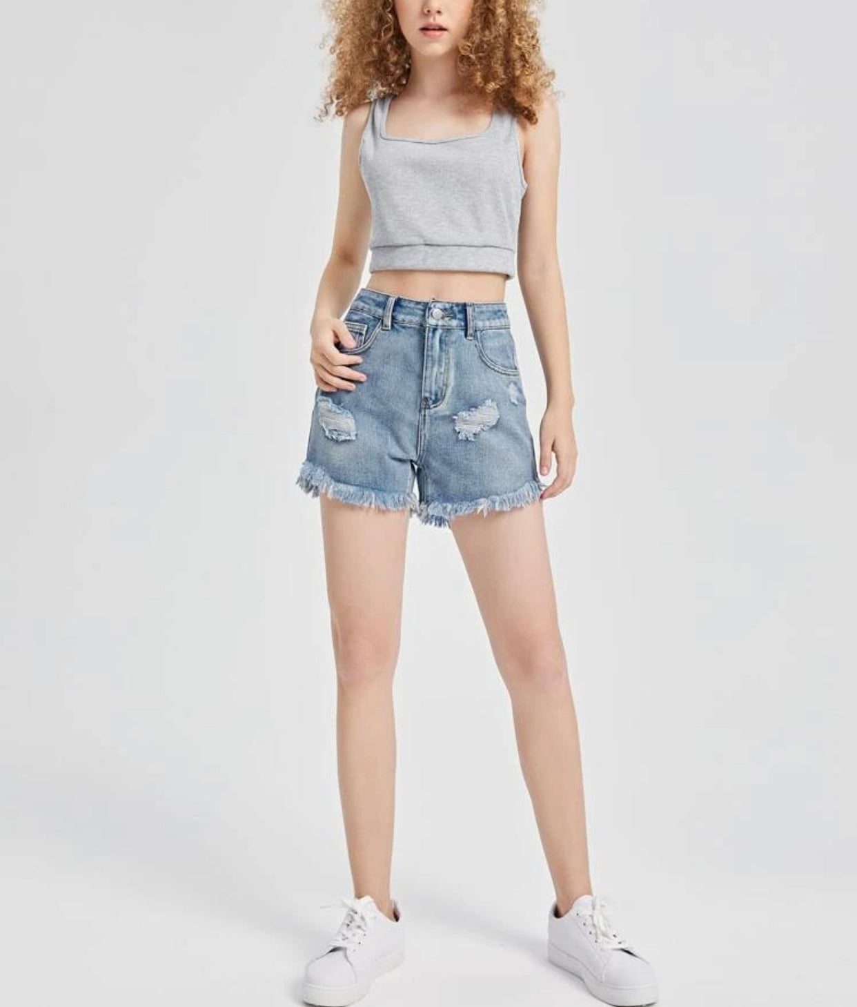Teen girls ripped raw cut denim shorts