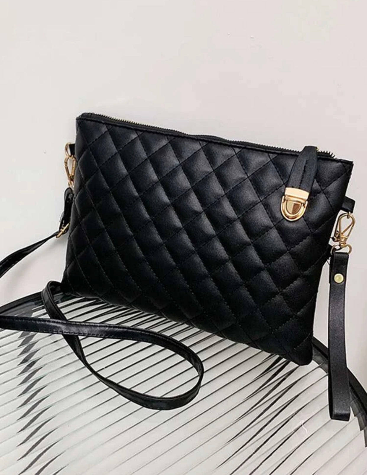 Quilted embossed zip crossbody bag