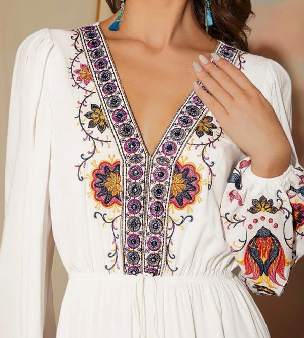 Floral embroidered lantern sleeve tassel tie front ruffle hem dress