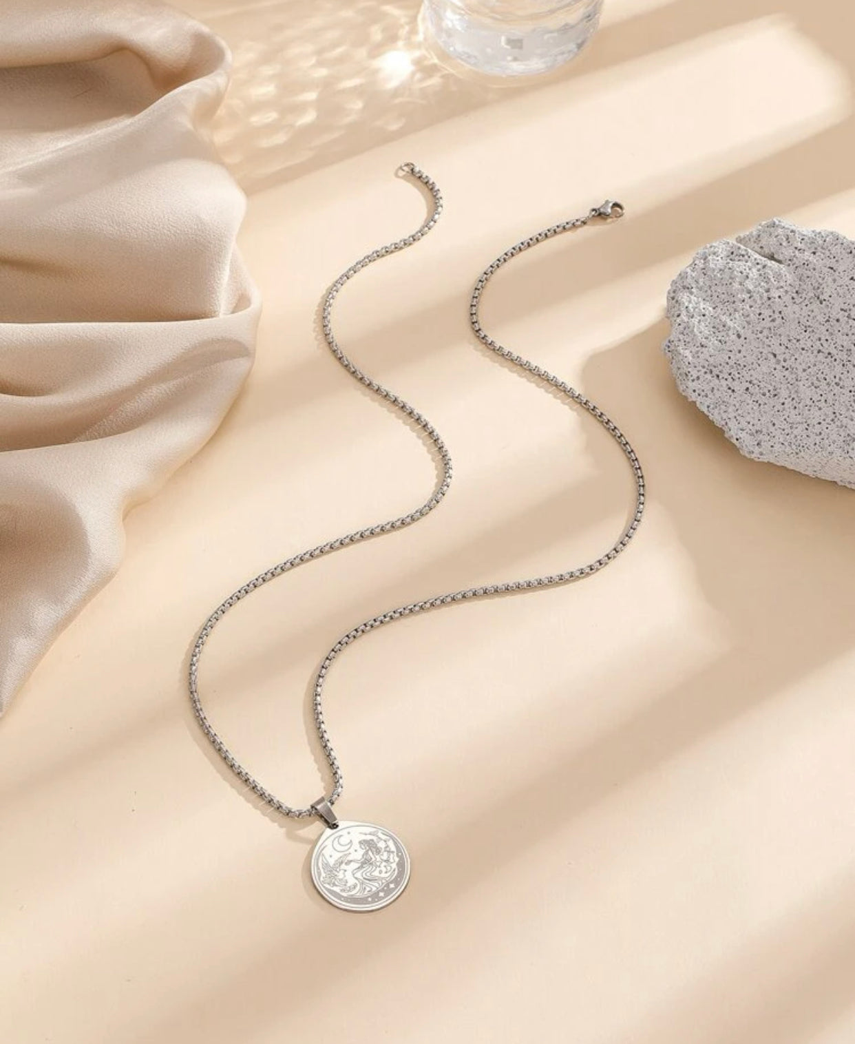 Figure graphic round charm necklace