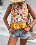 Floral print tie neck sleeveless blouse