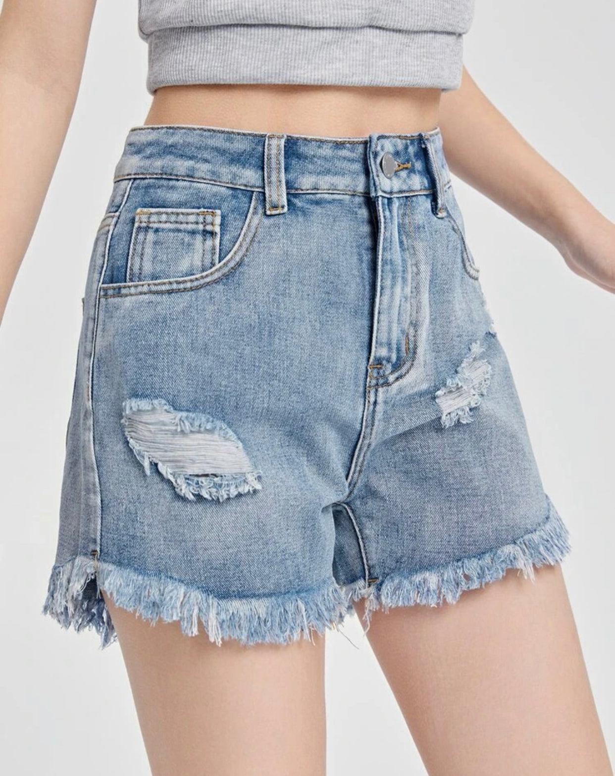 Teen girls ripped raw cut denim shorts