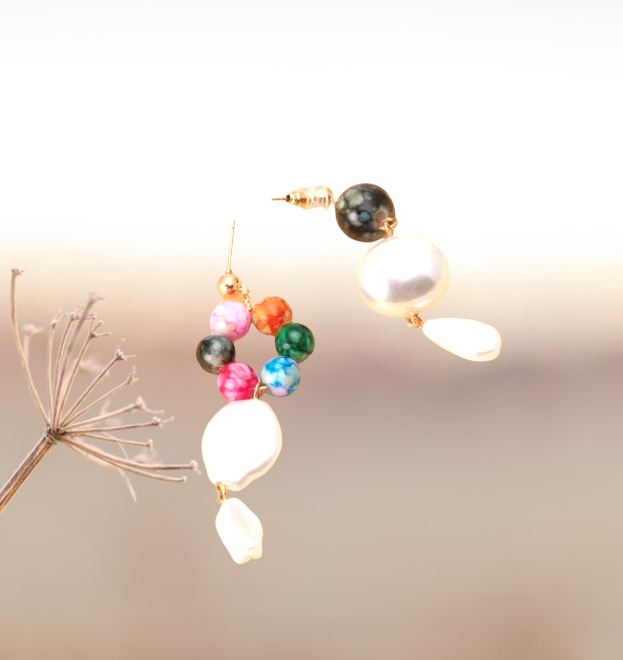 Faux pearl mismatched drop earrings
