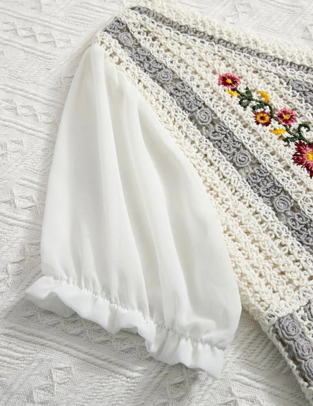 Floral embroidered puff sleeve peplum schiffy blouse