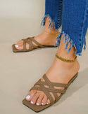 Brown cross design slide sandals