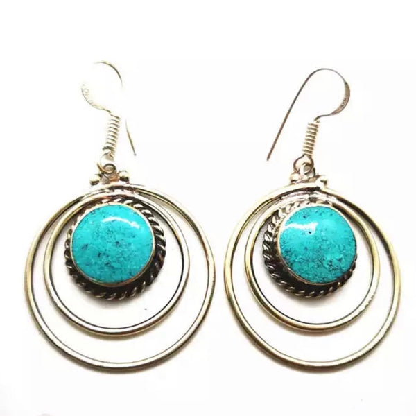 Turquoise and Tibetan silver dangle earrings.