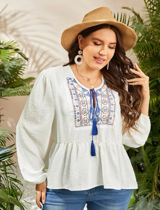 Curve and plus tassel tie neck geo embroidered yoke top