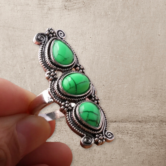 Green composite water drop decor statement ring. Size 8.