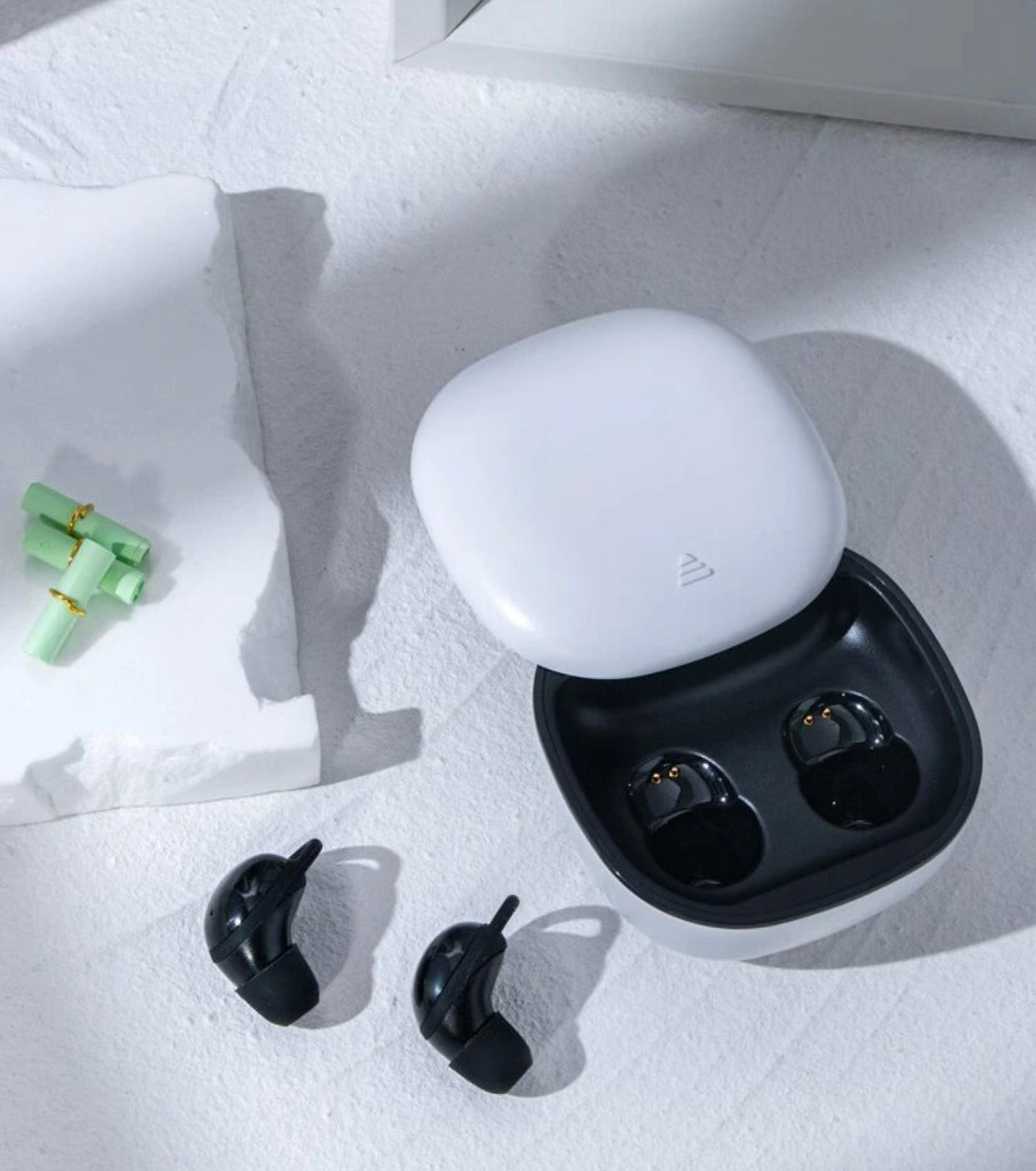 Minimalist wireless earbuds compatible with Bluetooth