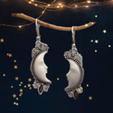 Silver moon design drop earrings