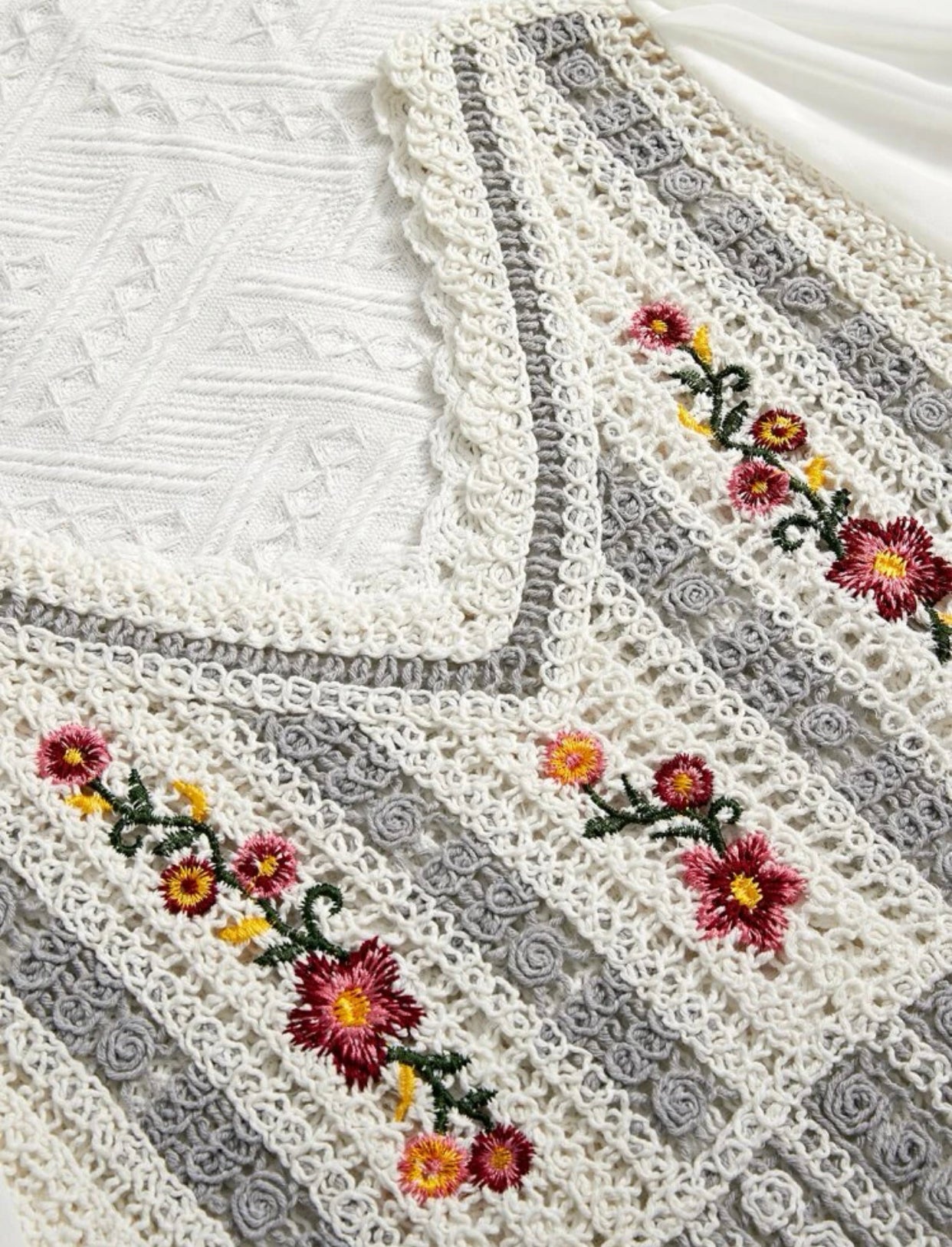 Floral embroidered puff sleeve peplum schiffy blouse