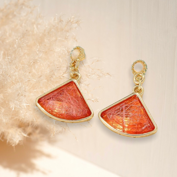 Red-orange charm drop earrings