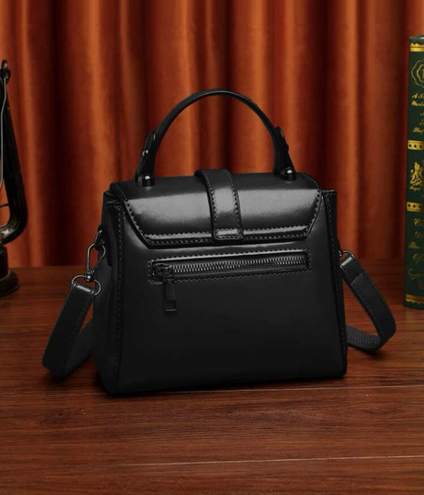 Black minimalist twist lock satchel bag