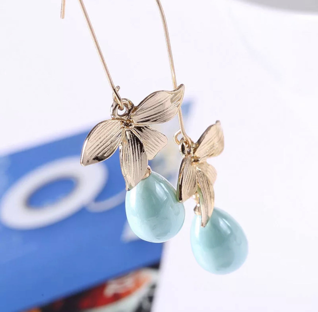 Delicate teardrop light blue stone trendy golden statement earrings