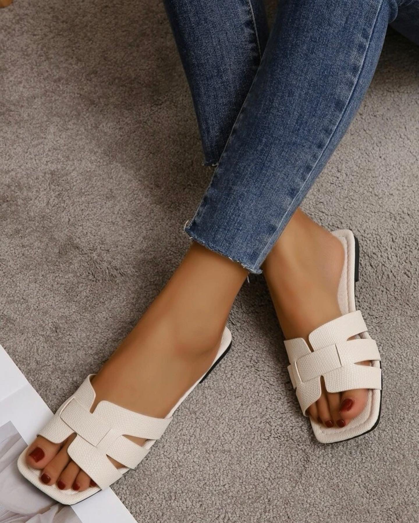 White cut out detail flat slide sandals