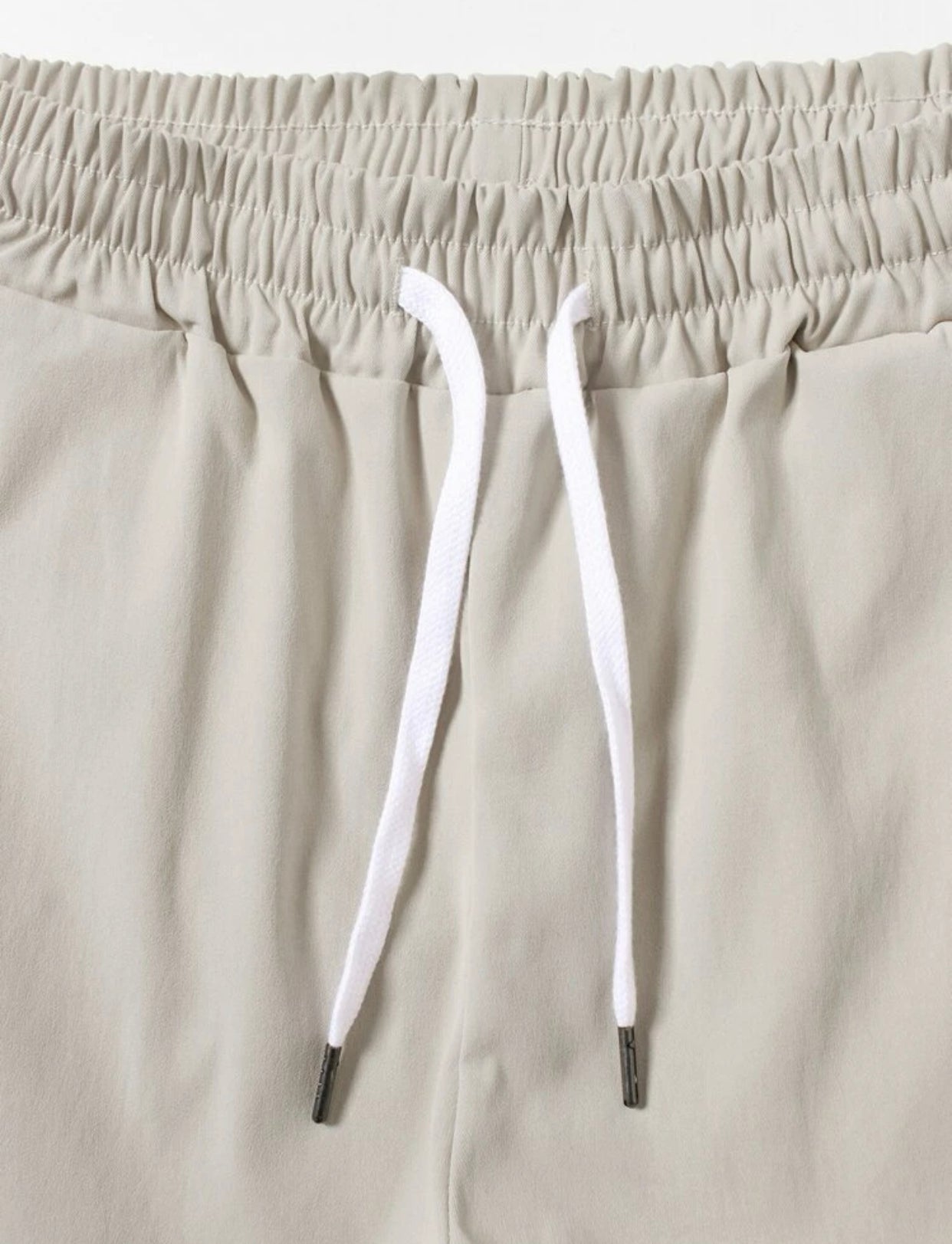 Men’s embroidered letter drawstring carrot pants
