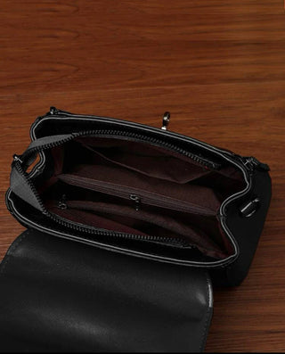 Black minimalist twist lock satchel bag