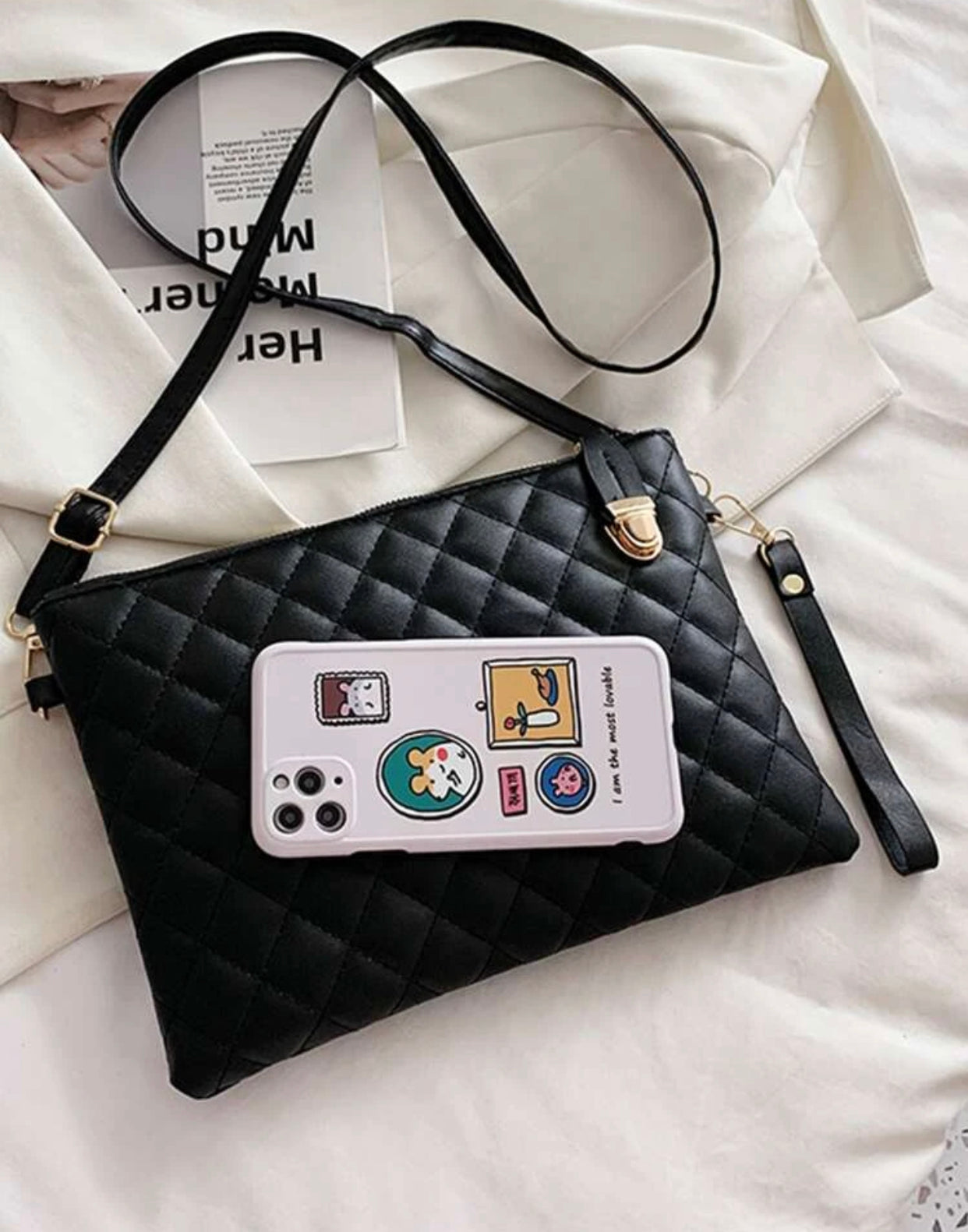 Quilted embossed zip crossbody bag