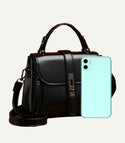 Black minimalist twist lock satchel bag