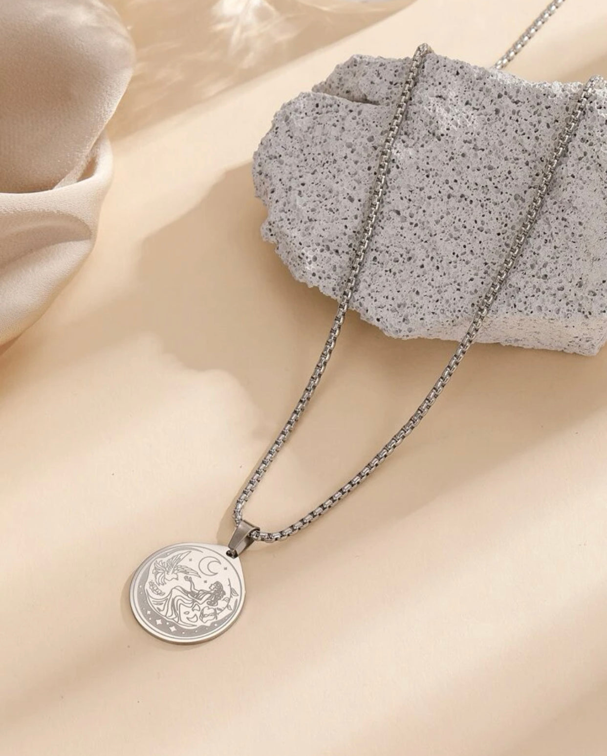 Figure graphic round charm necklace