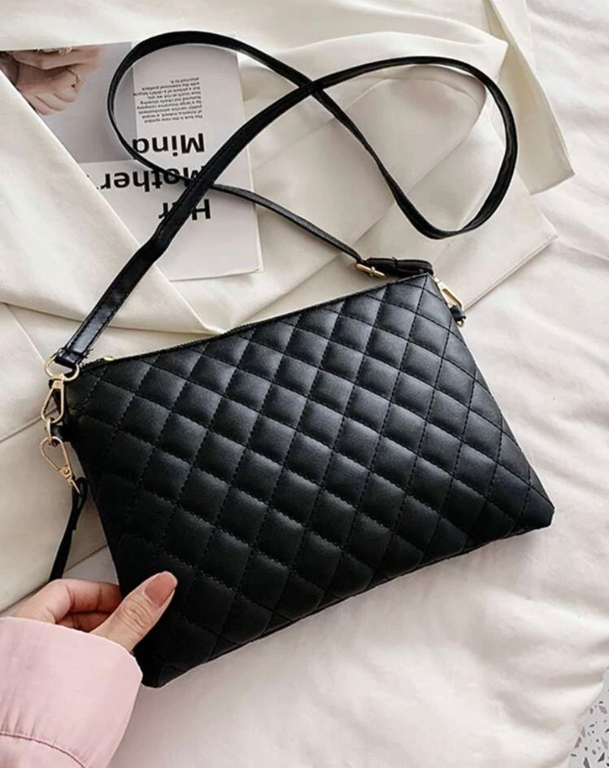 Quilted embossed zip crossbody bag