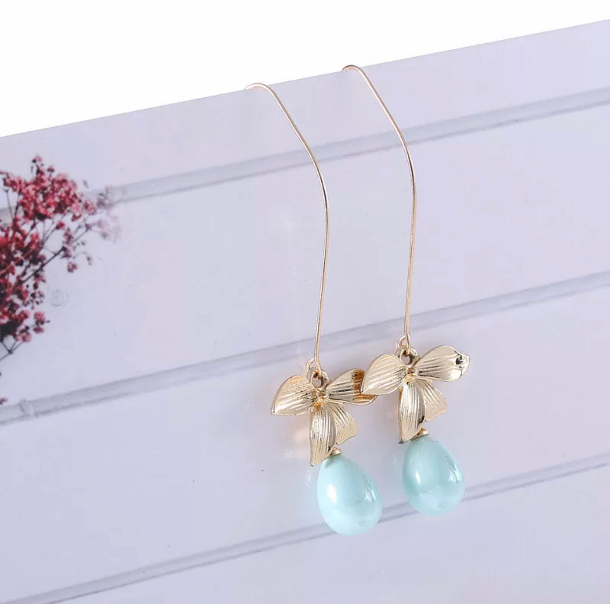 Delicate teardrop light blue stone trendy golden statement earrings