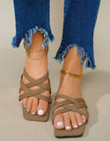 Brown cross design slide sandals